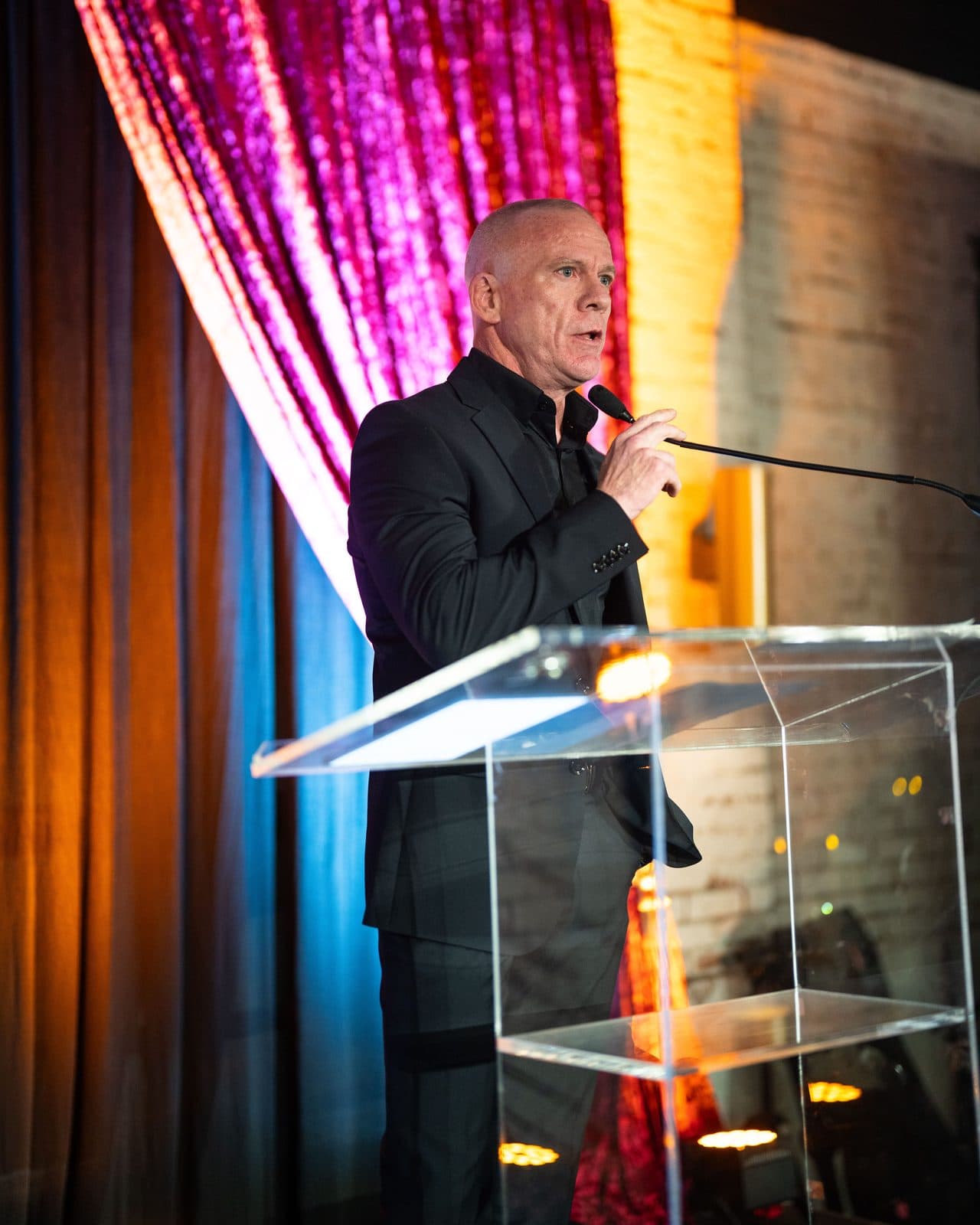 City Center's founder addressing the room during the Gala program